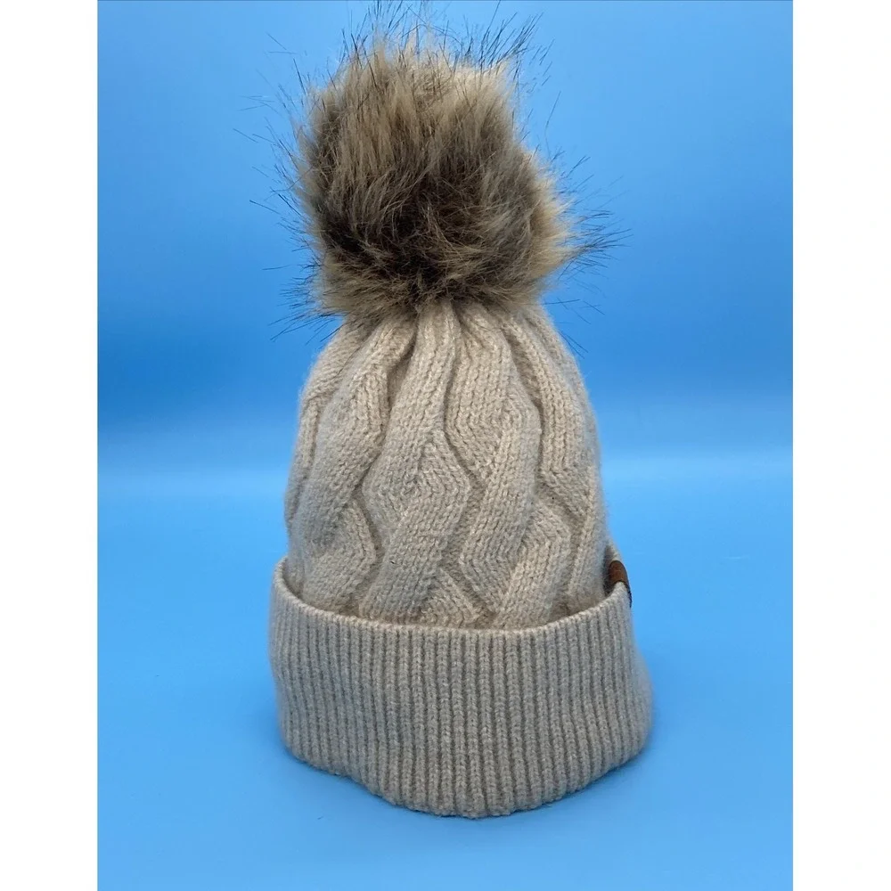 Britt's Knits Beige knit winter hat with faux fur pom pom